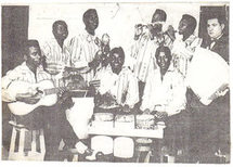 Groupe « Les C.D.J. » (Les Compagnons De Joie) Créé par Marie-Isidore DIABOUA « Lièvre » en 1952. - Debout, de g.à dr. André SANGA « Tcho », Célestin KOUKA ; Jacques PELLA « Lamotha » ; J.S. ESSOUS ; Charles YVORRA. DIABOUA (invisible)-